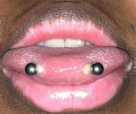 tongpiercing snake eye piercing|Snakes Eye Piercing Guide: Healing, Aftercare And Tips